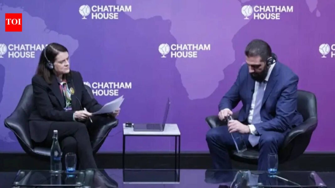 WATCH: Video of Syrian president struggling to open water bottle with help from female presenter during UK event goes viral