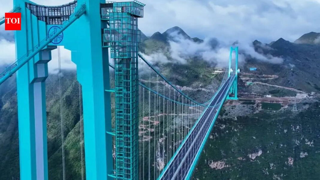 World's tallest Huajiang Grand Canyon Bridge cuts travel time from 2 hours to 2 minutes, joins 'Greatest Places of 2026' list | World News

