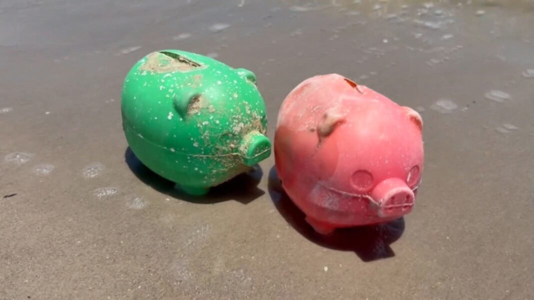 Dozens of mysterious piggy banks wash up on Texas beaches