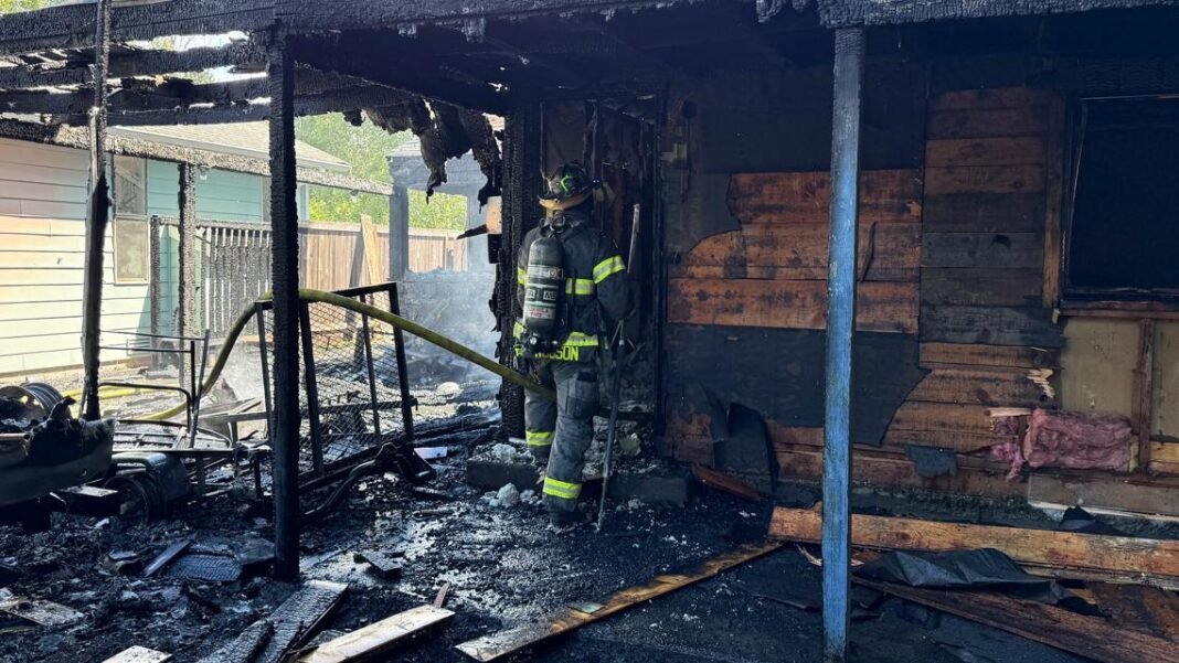 RV fire spreads to West Seattle home, prompting second alarm response

